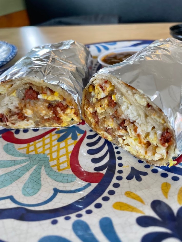 chorizo breakfast burrito wrapped in foil.